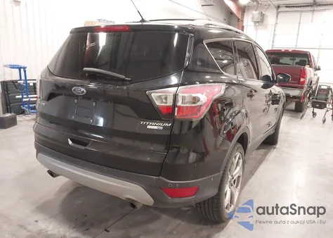 2017 Ford Escape Titanium z USA, uszkodzony, nr VIN 1FMCU9JD9HUA32064